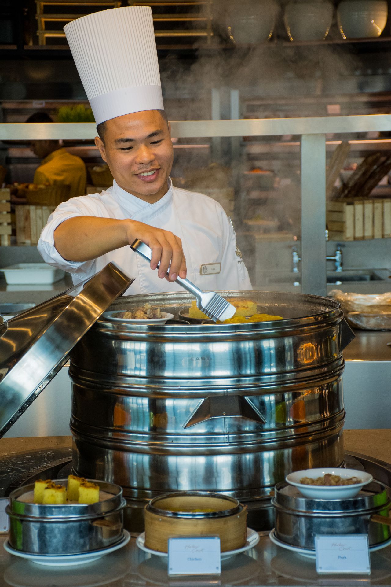 Chef preparing a Asian meal at The Kingsbury Hotel