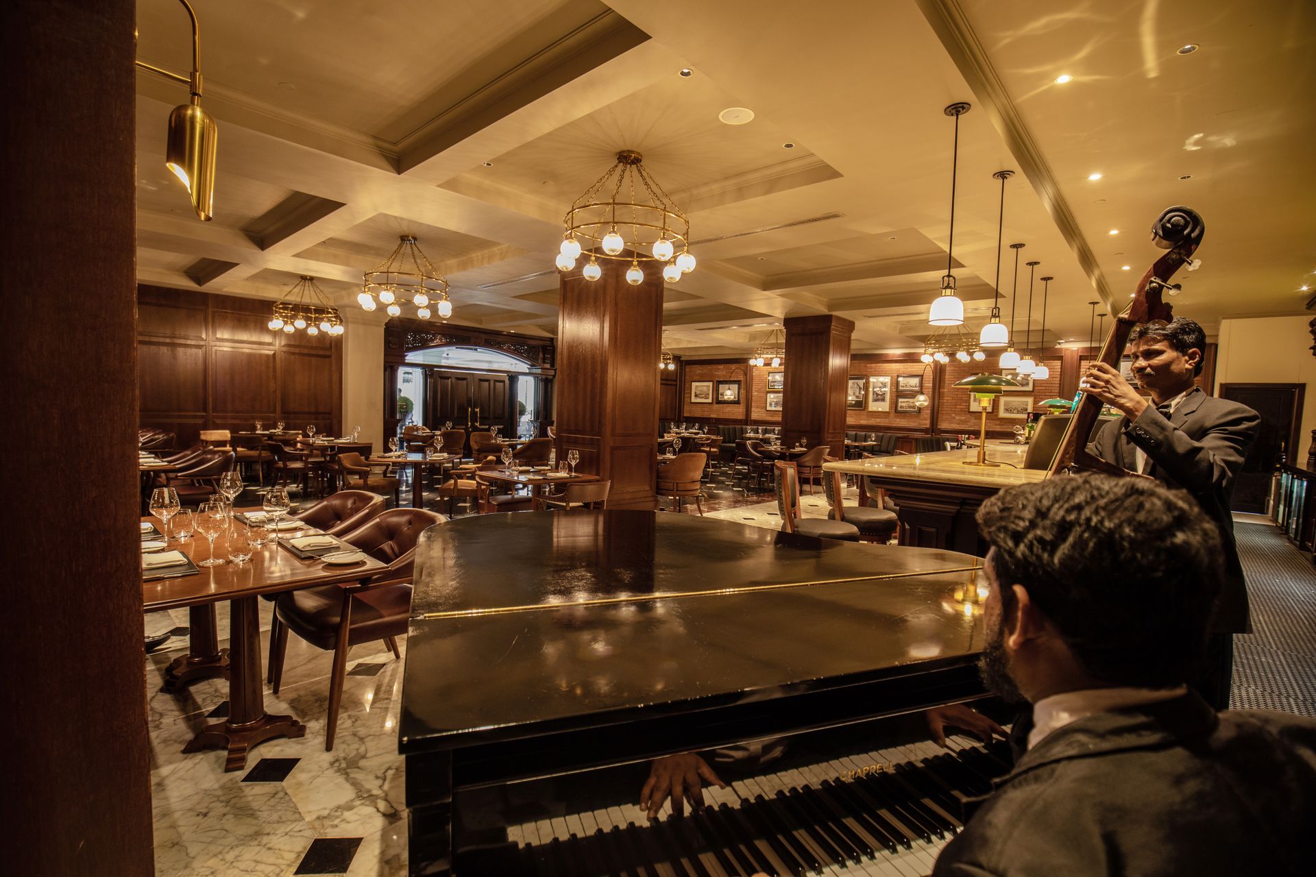 Pianist and a cellist playing at the Kings Steak bar  