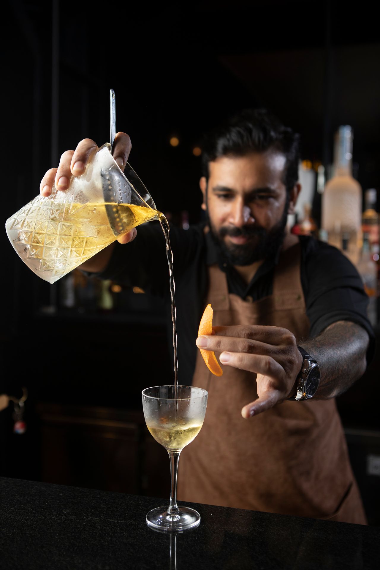 Bartender making a cocktail at The Kingsbury Hotel