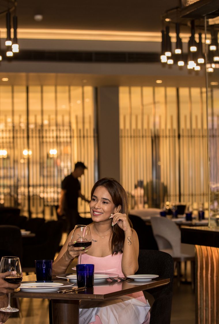 Young couple enjoying wine at The Kingsbury Hotel 