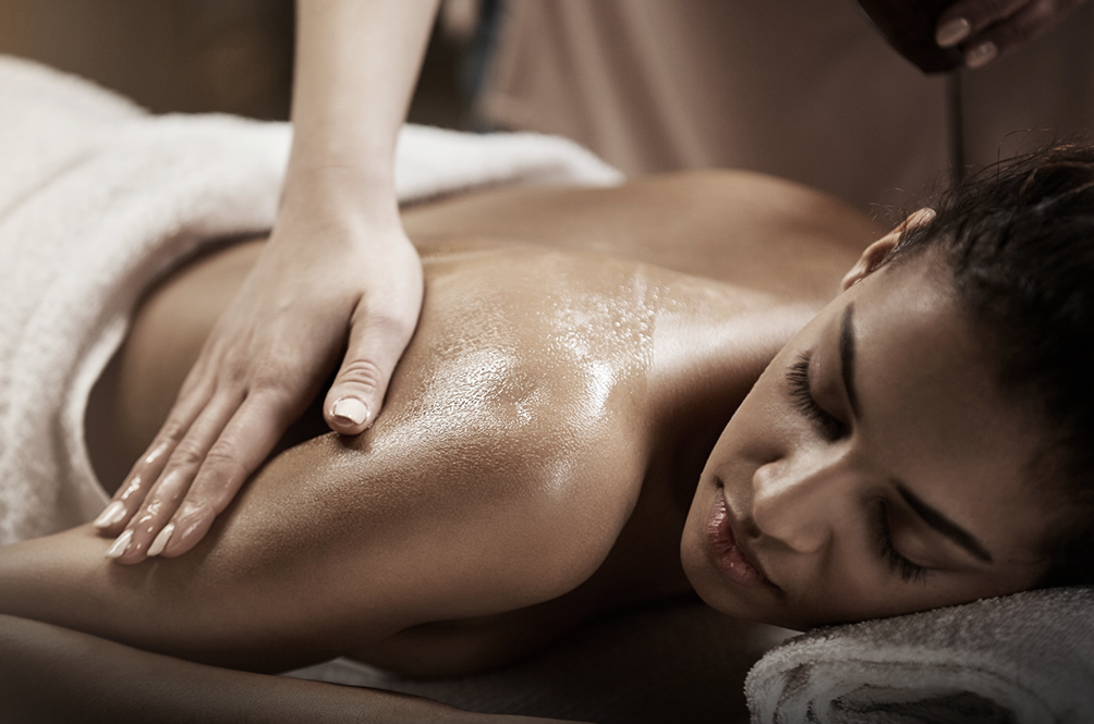 Lady getting a body massage at the Kingsbury spa
