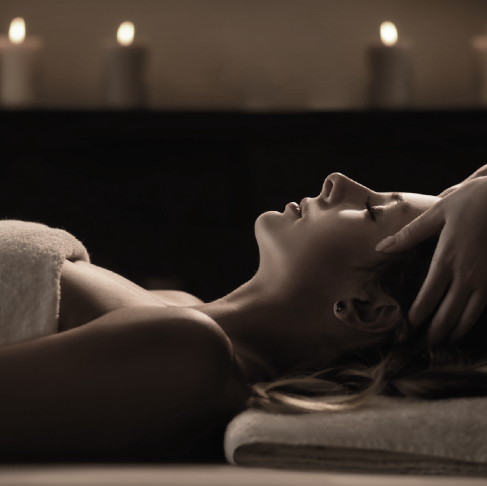 Lady getting a relaxing head massage at the Kingsbury spa