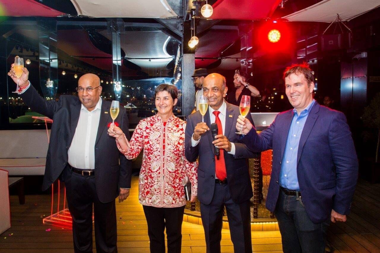 The executive team of Kingsbury and CELAVI toasting at an event