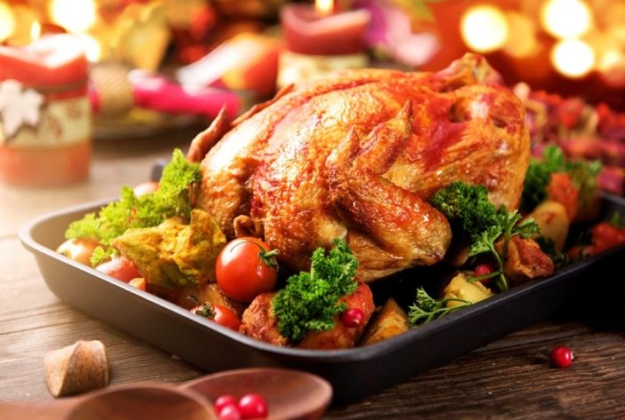 Roasted chicken dressed with baked vegetables and herbs at The Kingsbury Hotel