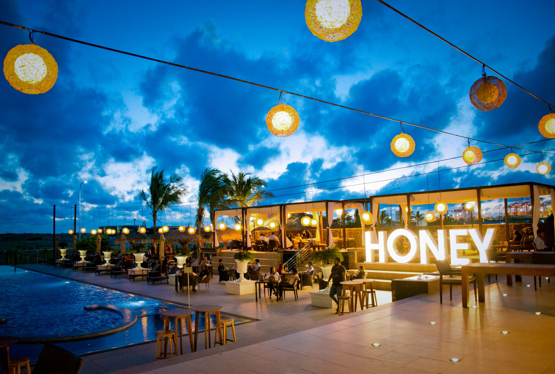 Pool bar with stunning evening skies of Colombo at The Kingsbury Hotel