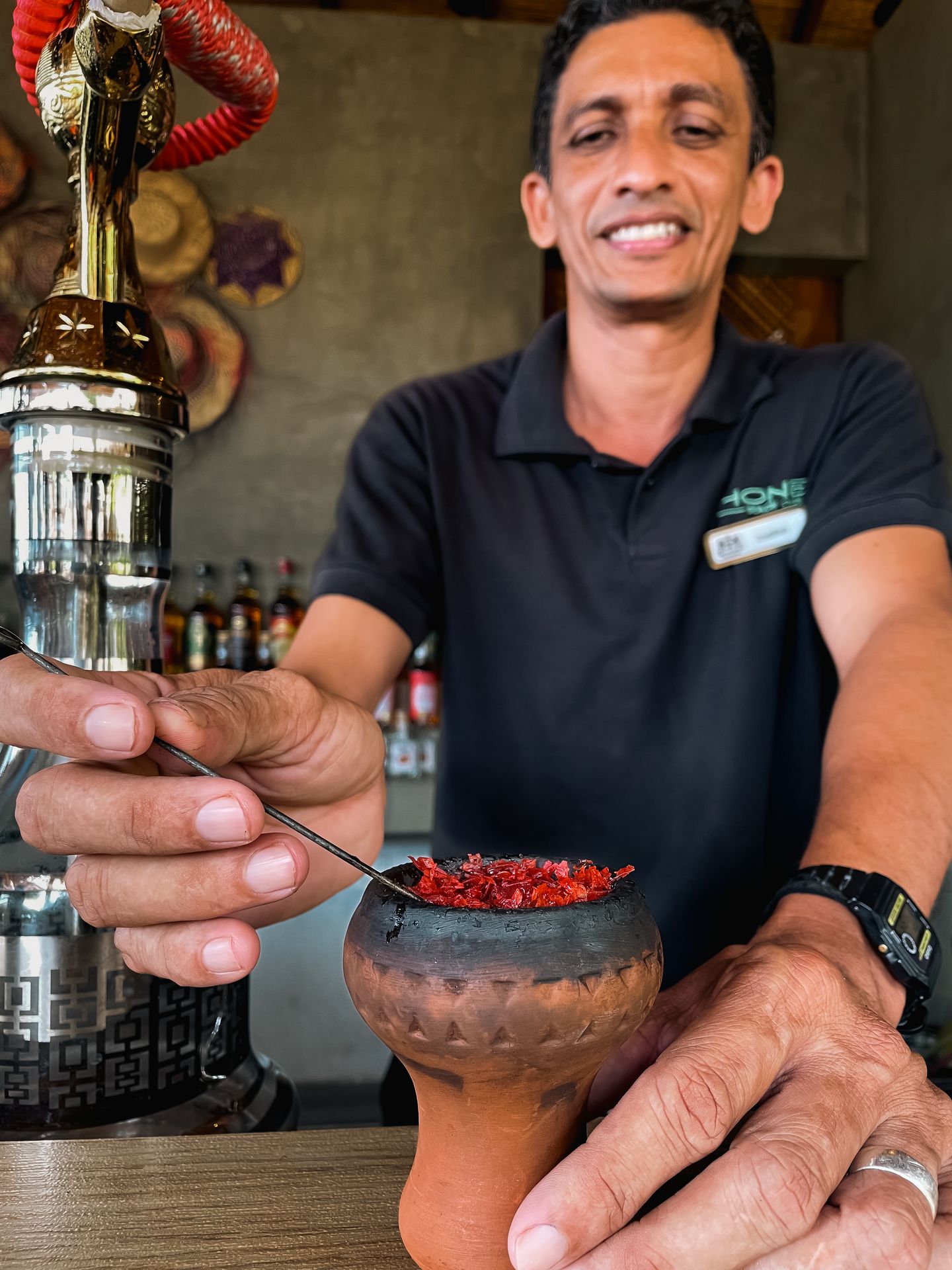 Bartender preparing a local culture-inspired cocktail at The Kingsbury Hotel 