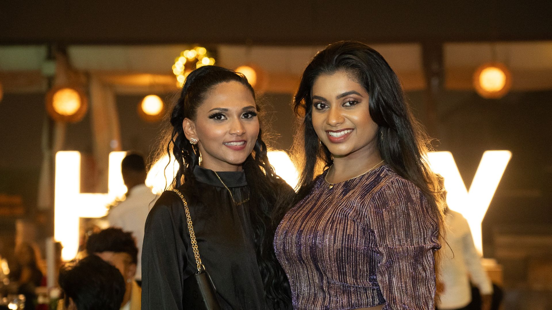 Two girls posing for a photo
