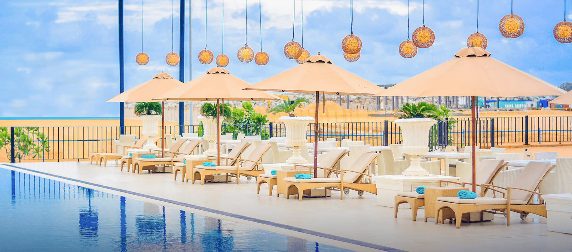 Outdoor poolside lounge at The Kingsbury Colombo